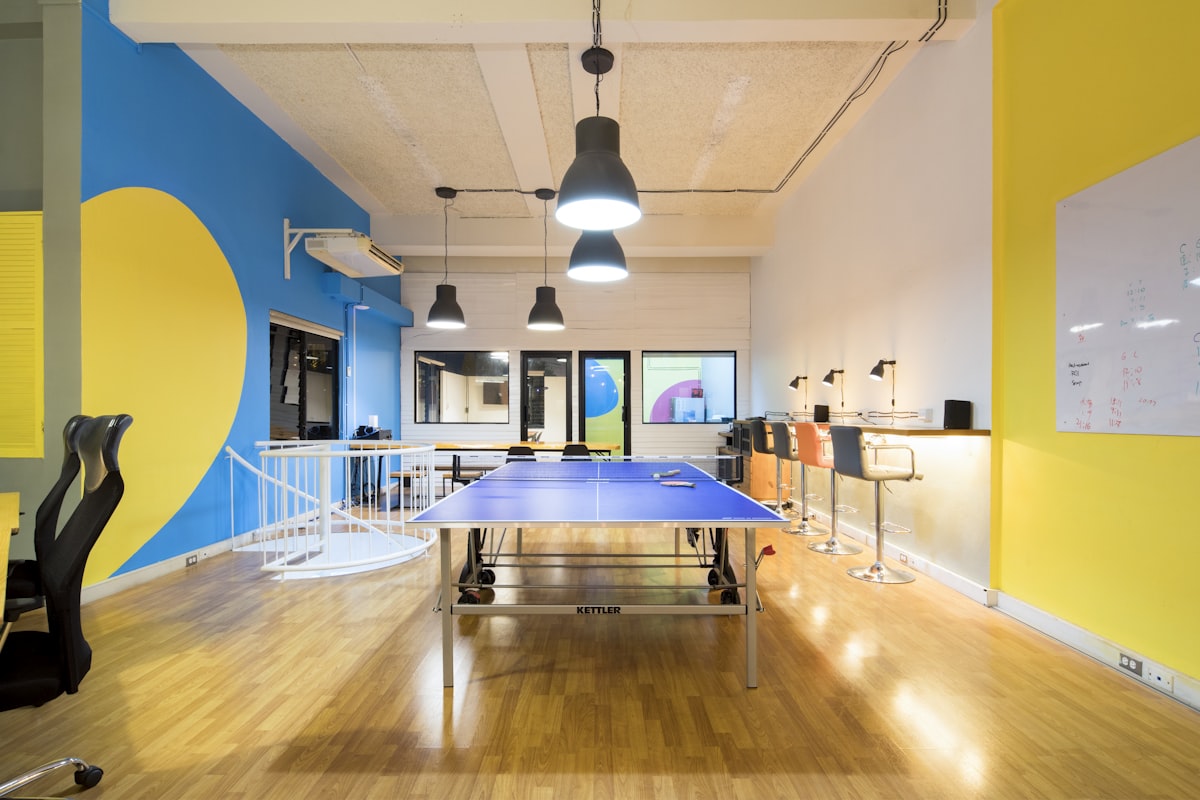 Modern office with a ping pong table and work areas